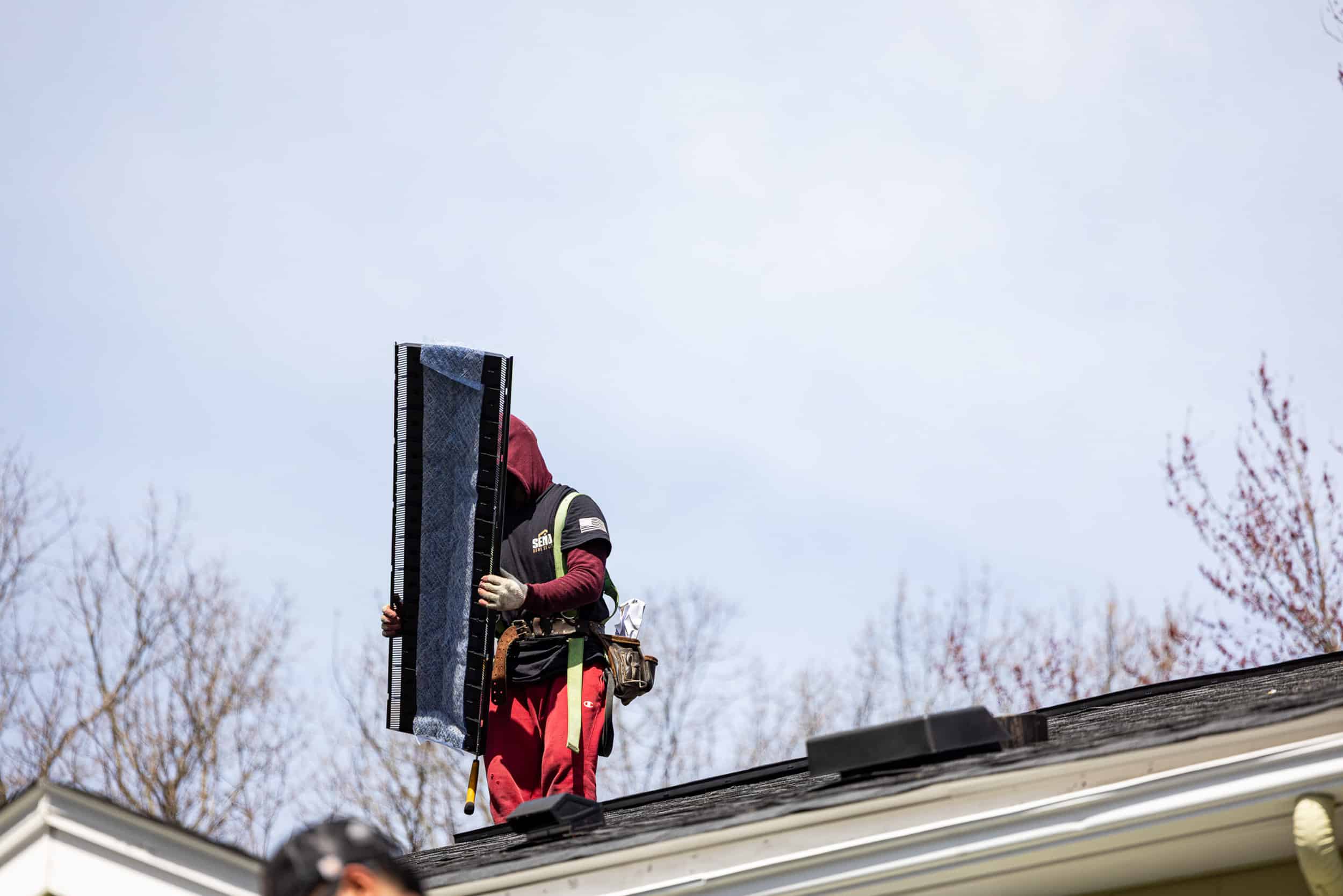 Storm-damaged shingle and flashing repair on a home in Burlington, MA